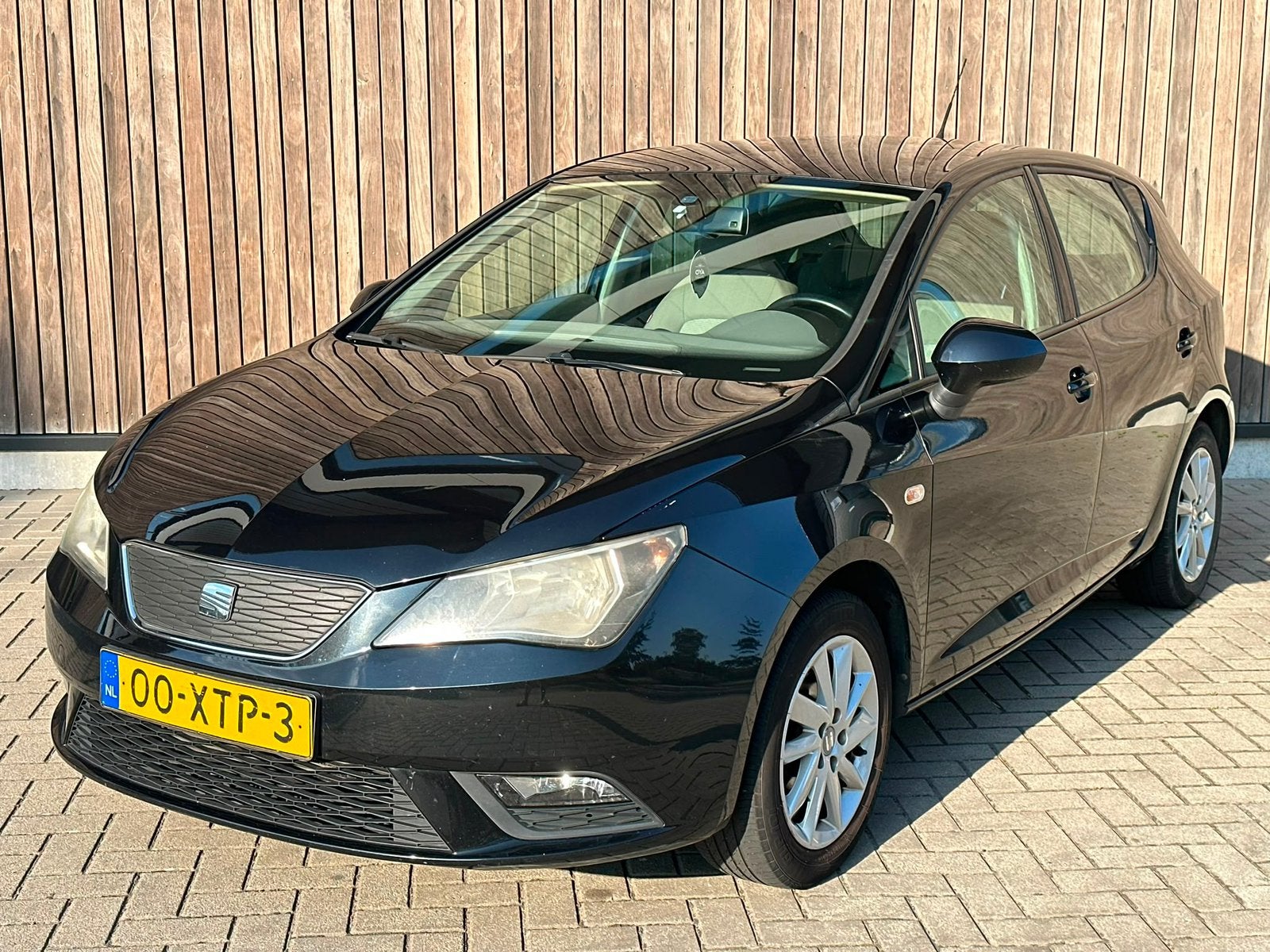 Seat Ibiza 1.2 TDI 55KW Ecomotive 2012 Zwart, Auto's, Seat, Voorwielaandrijving, 74 pk, 1199 cc, 96 €/maand