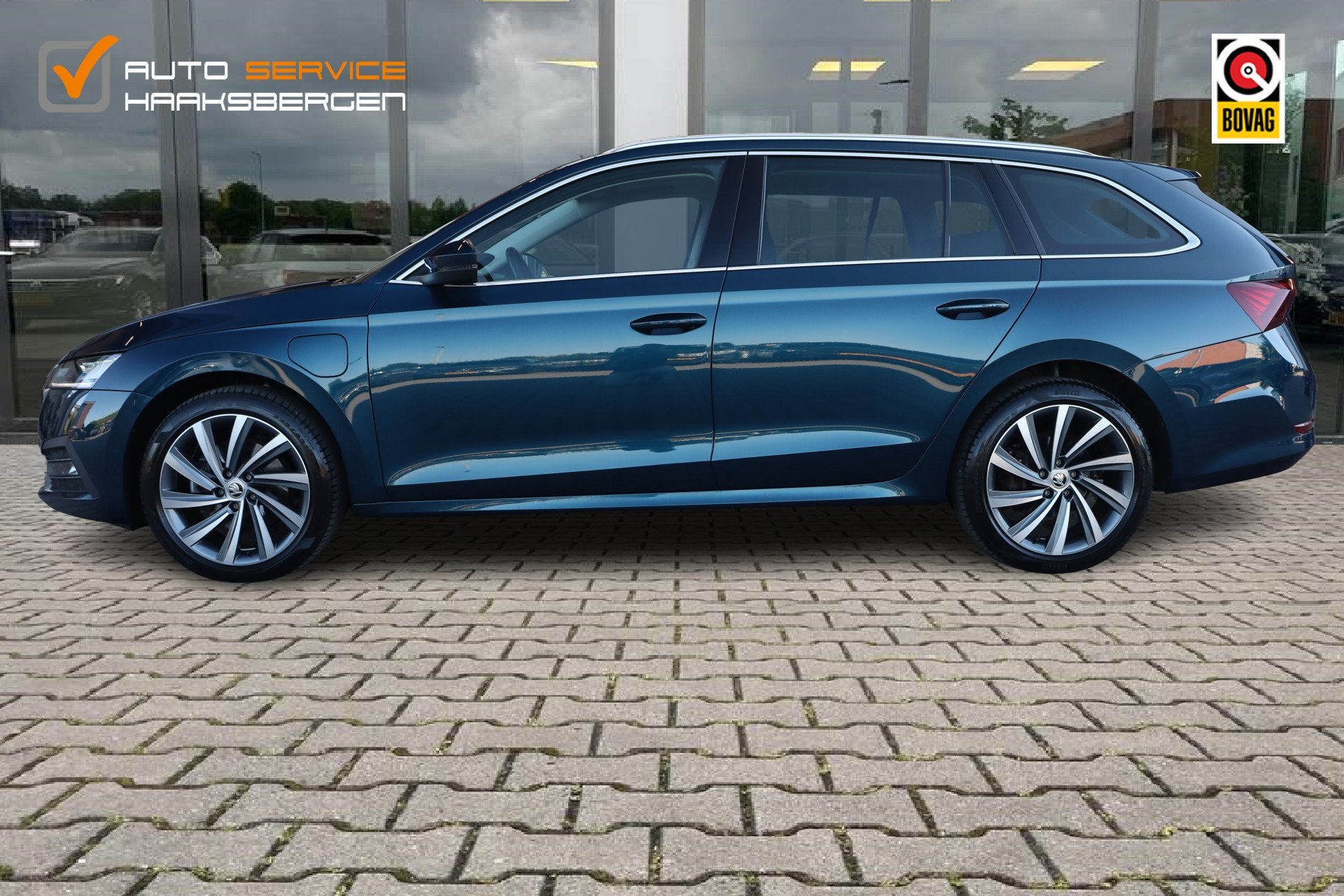 Skoda Octavia Combi 1.4 TSI iV PHEV Business Edition Plus |, Auto's, Stof, Gebruikt, Zwart, Blauw