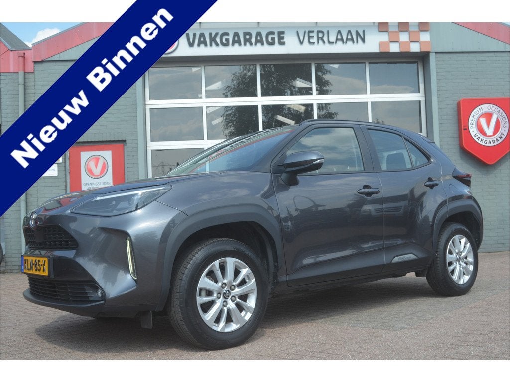 Toyota Yaris Cross 1.5 Hybrid 12 mnd. gar. (bj 2023), Auto's, 12 maanden, Stof, Gebruikt, 23 km/l