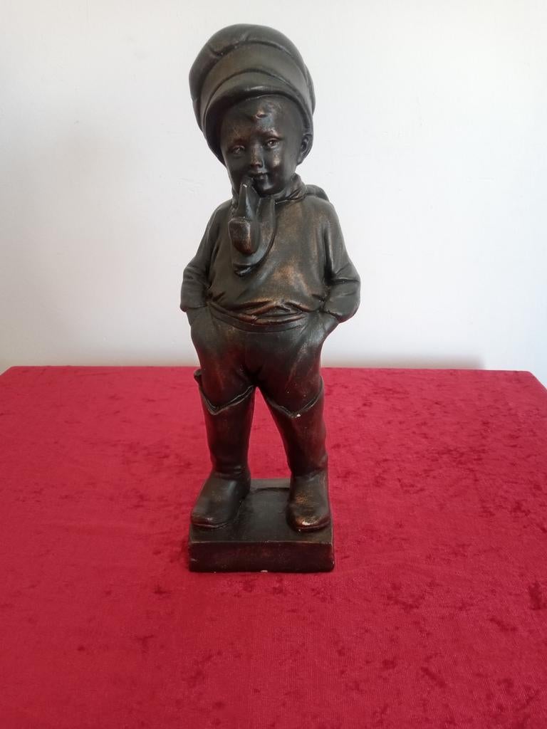 BRONZEN BEELD CONTENTE, Ophalen