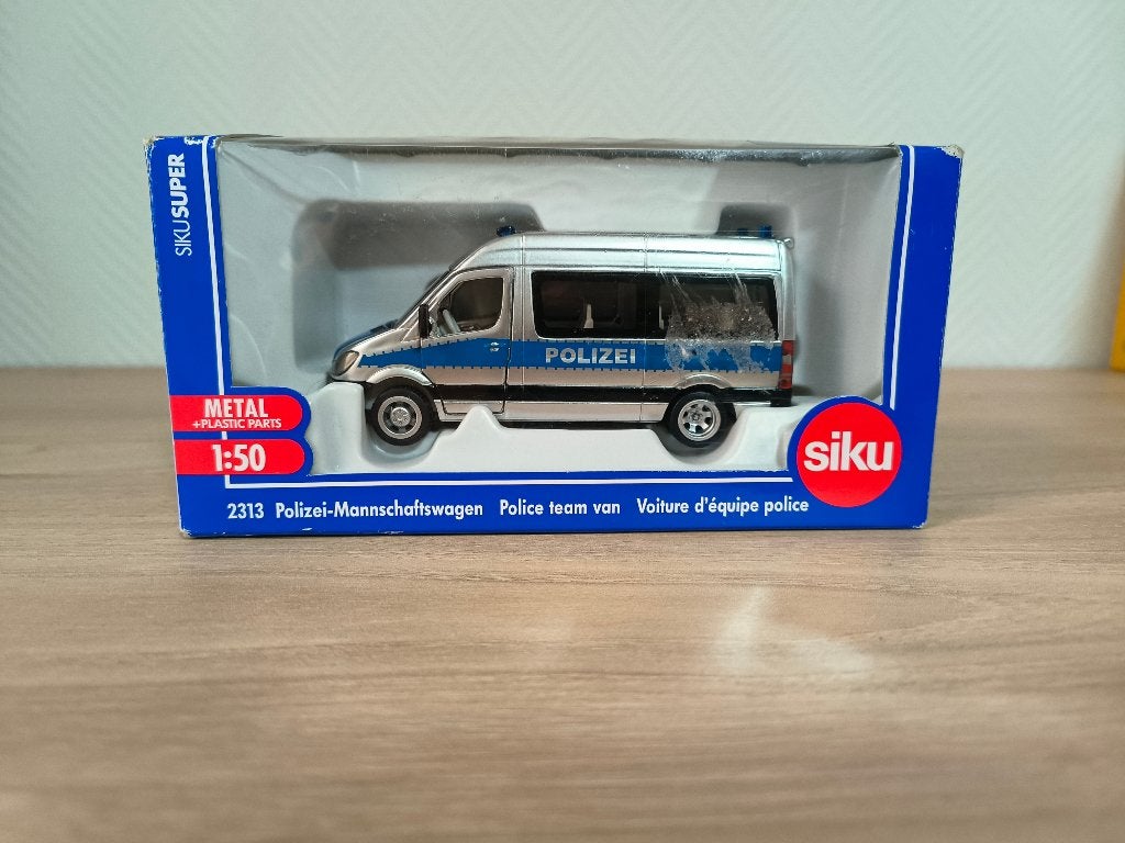Siku polizei sprinter met licentiezegel 41, Hobby en Vrije tijd, Modelauto's | 1:50, Ophalen of Verzenden, Nieuw, Bus of Vrachtwagen