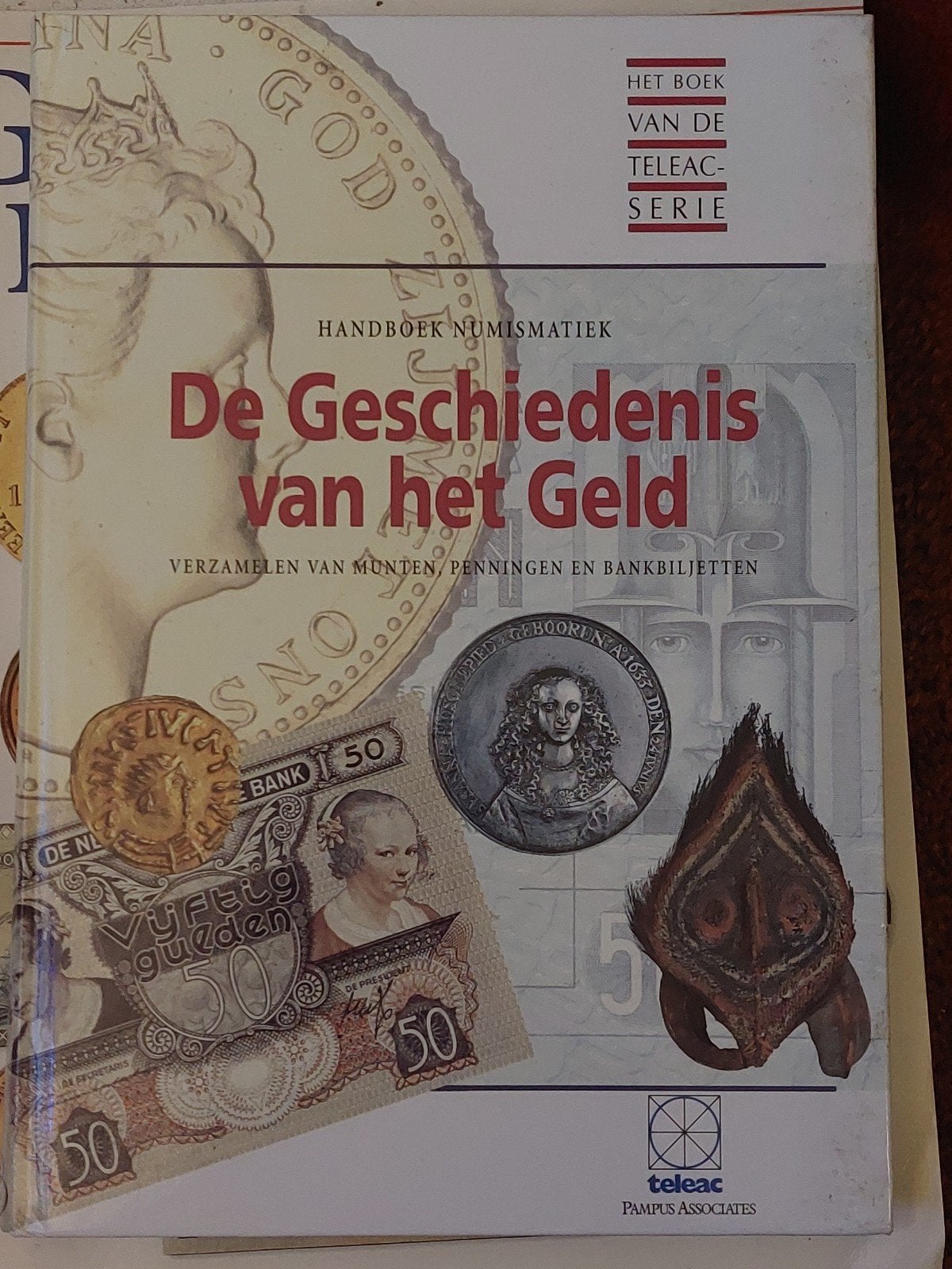 Boek: De Geschiedenis van het Geld - Handboek Numismatiek, Postzegels en Munten, Ophalen of Verzenden