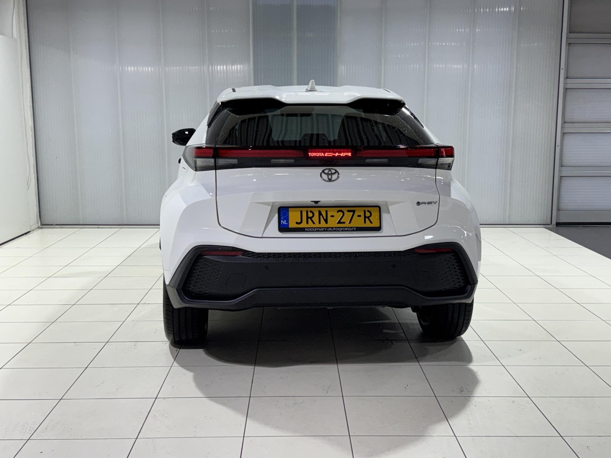 Toyota C-HR 2.0 Plug-in Hybrid 220 Dynamic Apple carplay/anr, Auto's, 4 cilinders, Wit, Bedrijf, Grijs