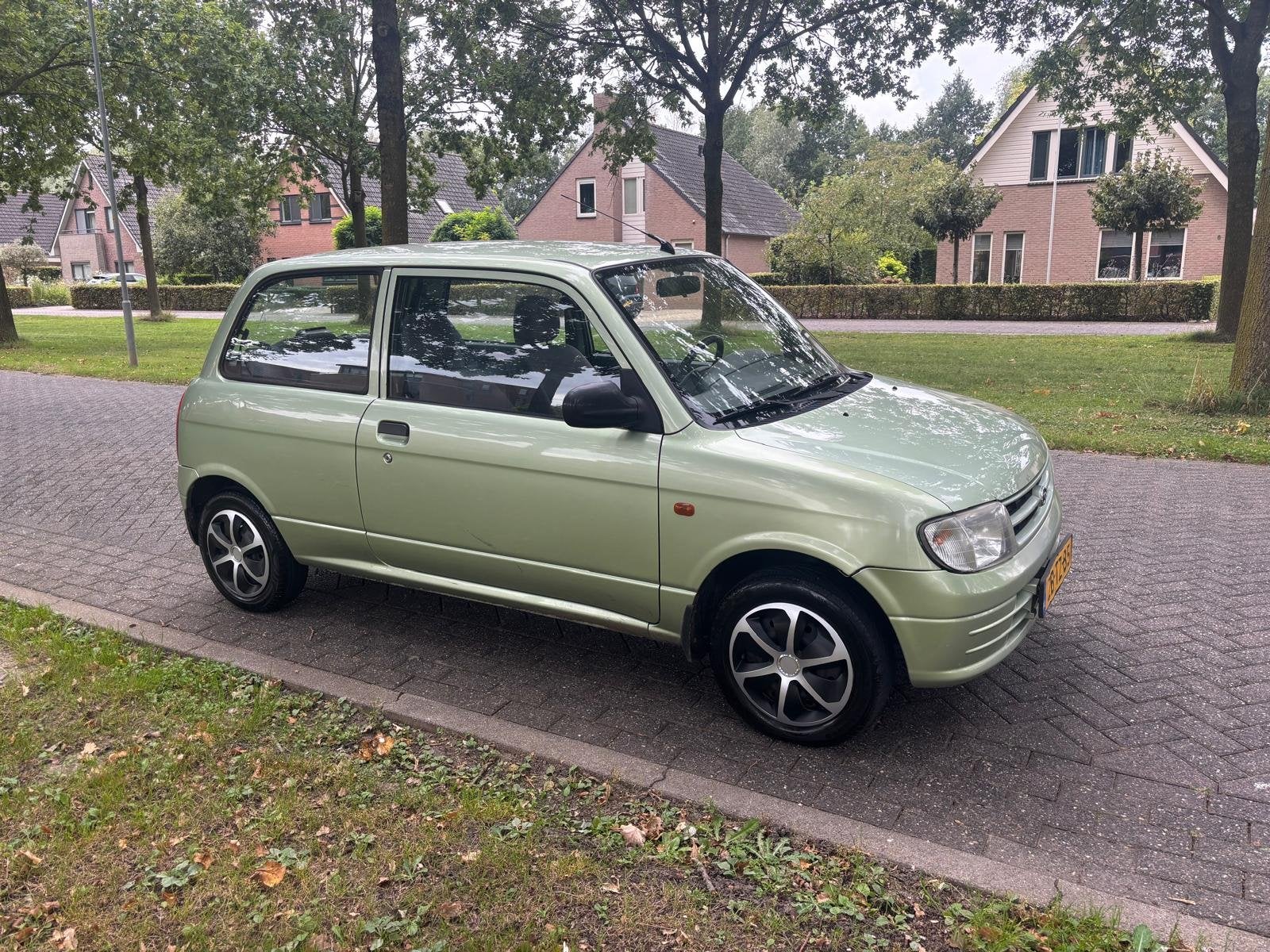 Daihatsu Cuore 1.0-12V XTi (bj 1999), foto 2