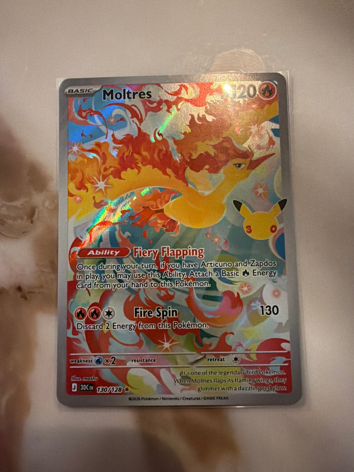 Moltres 130/128 Celebrations Pokémon Kaart Foil, Ophalen of Verzenden, Zo goed als nieuw, Losse kaart, Foil