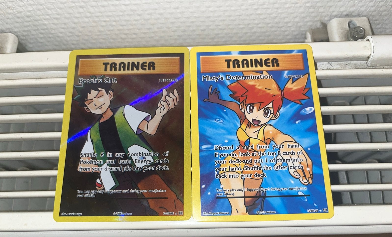 Pokémon Trainer Kaarten: Brock's Grit & Misty's Determinatio, Ophalen of Verzenden, Zo goed als nieuw, Meerdere kaarten