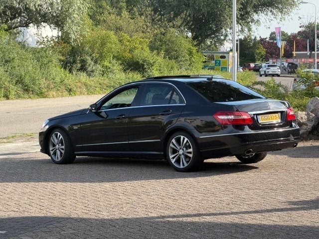 Mercedes-Benz E-Klasse 3.5 E350 CGI Sedan AUT 2009 Zwart, Auto's, Automaat, Achterwielaandrijving, Zwart, 2000 kg