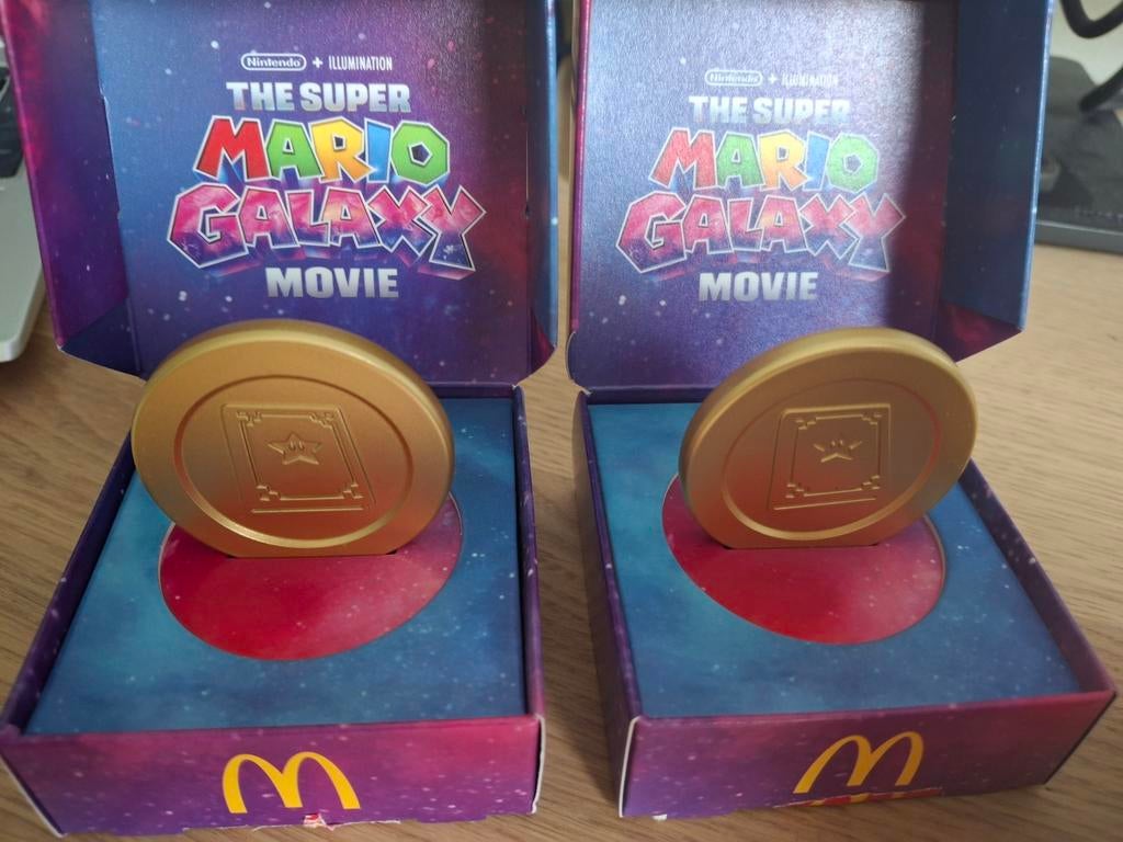McDonald's Super Mario Galaxy Boek Movie Munten (2 stuks), Ophalen of Verzenden, Nieuw