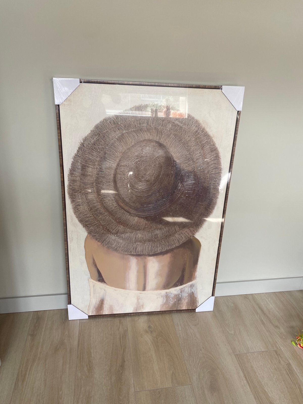Gloednieuw schilderij, vrouw met hoed, Ophalen