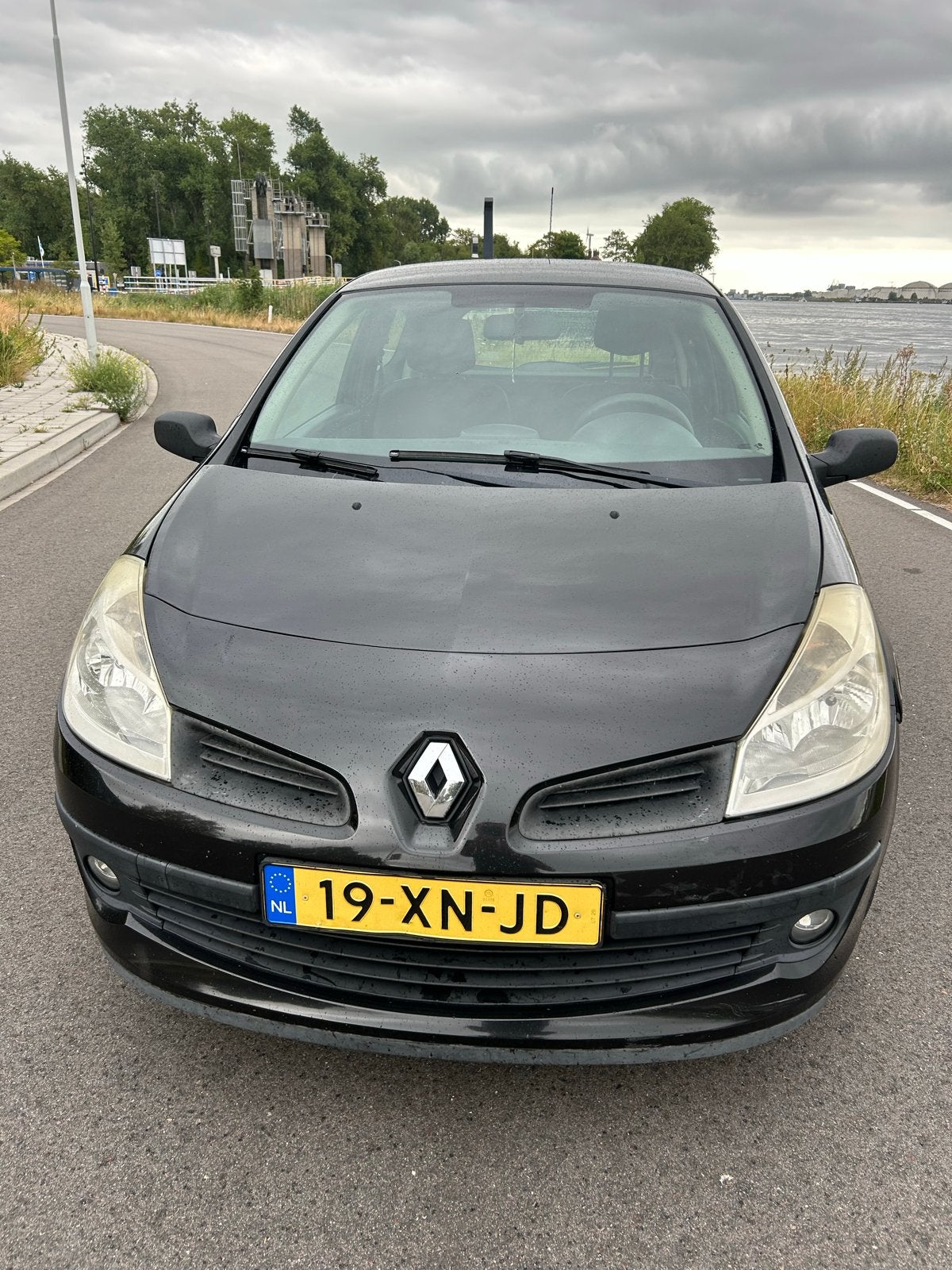 Renault Clio 1.2 16V 75 pk 3D 2007 Zwart, Auto's, Renault, Voorwielaandrijving, 535 kg, 74 pk, 4 cilinders