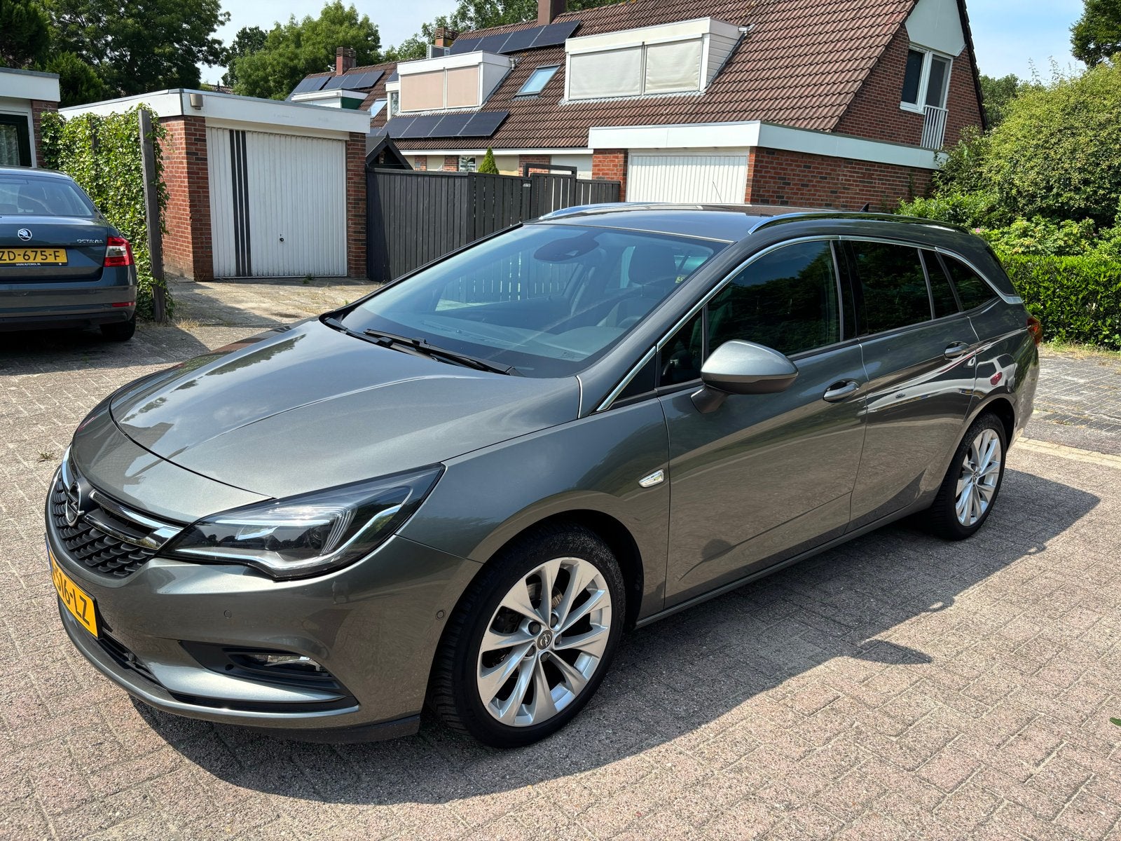 Opel Astra 1.4 Turbo 150pk Start/stop 2019 Grijs, Auto's, Leder en Stof, Grijs, Particulier, 149 pk
