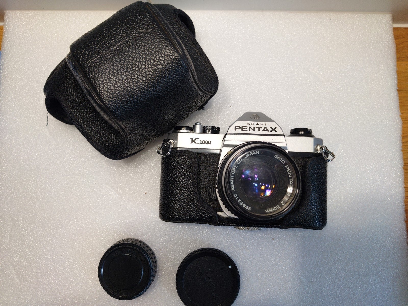 Pentax K1000 Spiegelreflexcamera met lens en leren tas, Audio, Tv en Foto, Ophalen of Verzenden, Zo goed als nieuw, Spiegelreflex