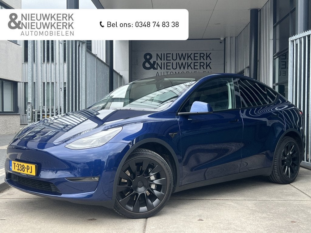 Tesla Model Y Long Range AWD 75 kWh (bj 2023, automaat), Auto's, Tesla, Gebruikt, Huisgarantie, Met garantie (alle), Blauw