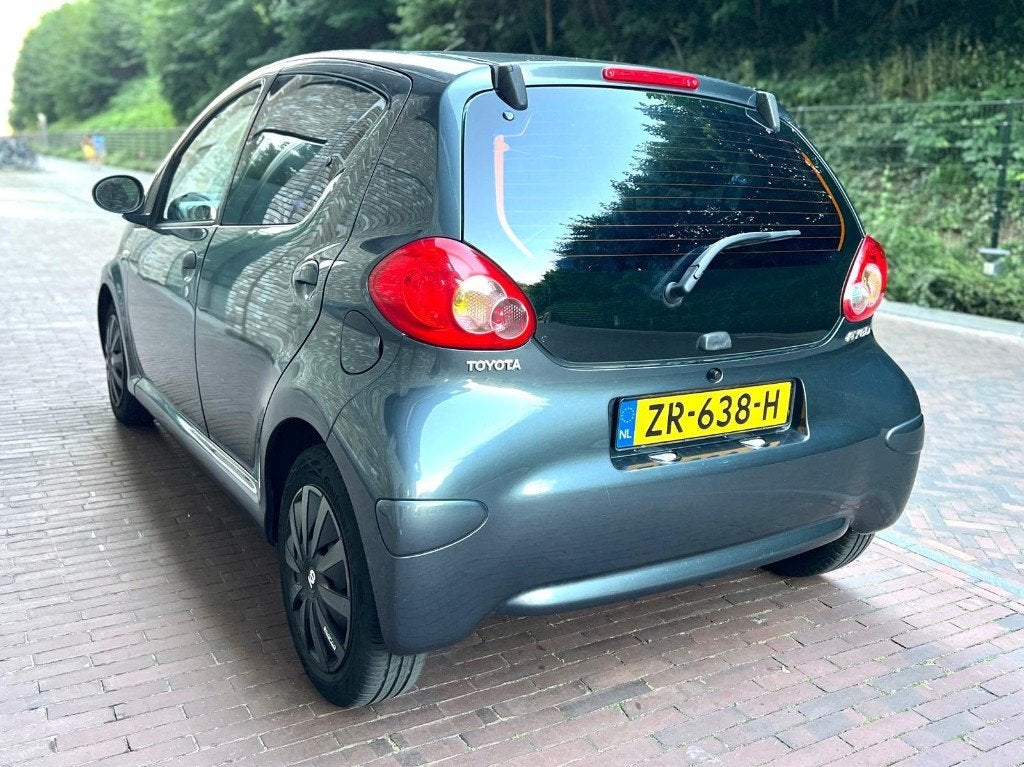 Toyota Aygo 1.0-12V 5DRS Dyna Pakket | Airco | NW APK | Navi, Auto's, Voorwielaandrijving, Stof, Euro 6, 68 pk