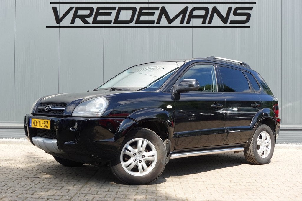 Hyundai Tucson 2.0i Dynamic Cross, Auto's, Hyundai, Stof, Gebruikt, 4 cilinders, Metallic lak