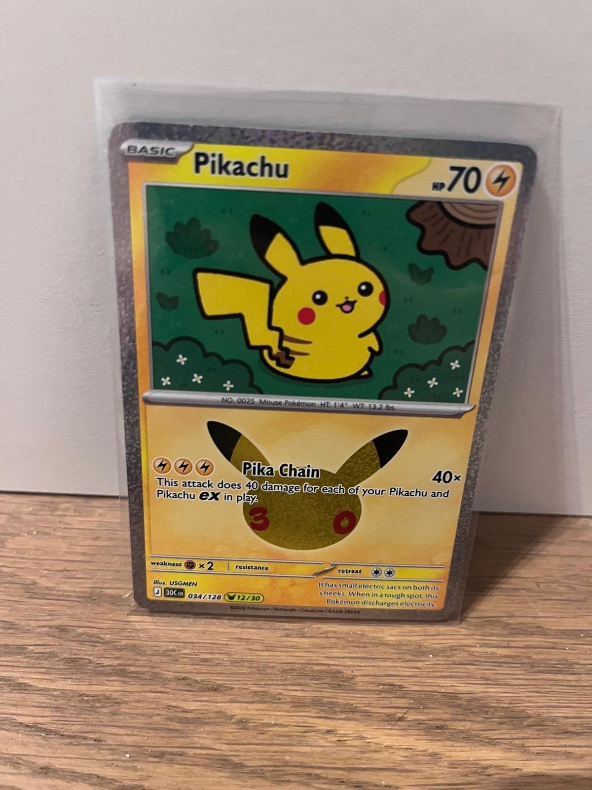 034/128 is de Pikachu 12/30 uit Pokémon 30th Celebration,, Ophalen of Verzenden, Zo goed als nieuw, Losse kaart