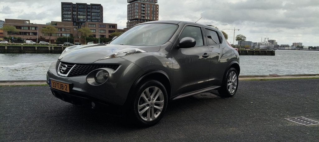 Nissan Juke 1.6  86KW 2012 Grijs vol-Leer, navi, camera, Auto's, Dealer onderhouden, 1250 kg, 4 cilinders, Origineel Nederlands