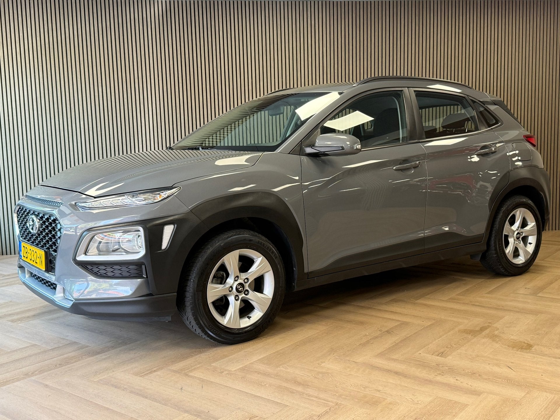 Hyundai Kona 1.0 T-GDI Comfort NAVI CAMERA CLIMATE CRUISE CO, Stof, Gebruikt, Met garantie (alle), Origineel Nederlands