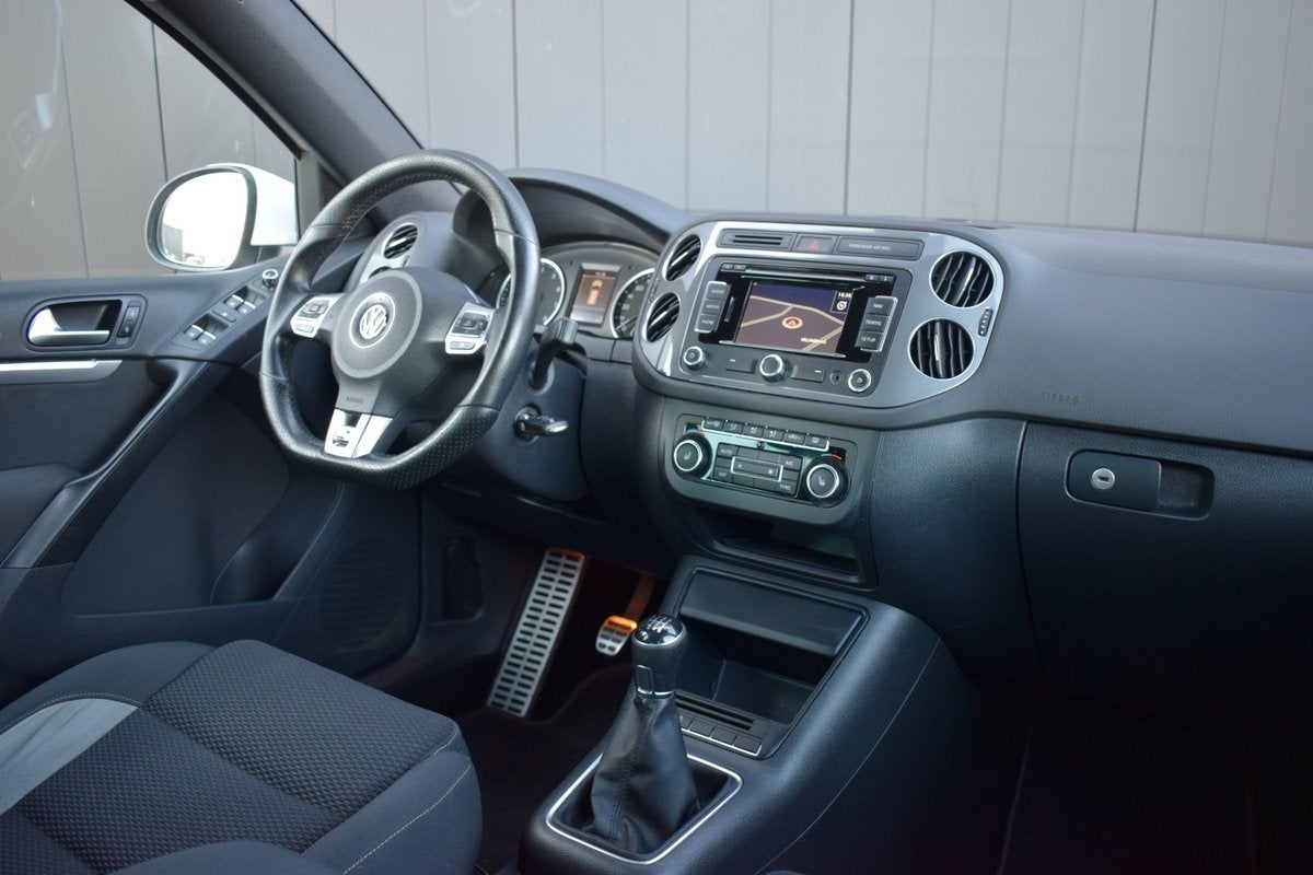 Volkswagen Tiguan 1.4 TSI R-Line ECC | Sportstoelen | Full M, Voorwielaandrijving, Euro 5, 15 km/l, Gebruikt