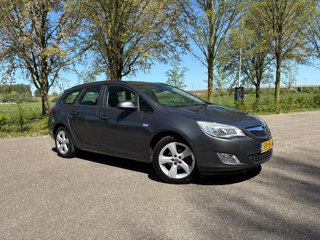 Opel Astra 1.4 Turbo 88KW Sports Tourer 2012 Grijs, Auto's, Stationwagon, Handgeschakeld, Particulier, 140 pk
