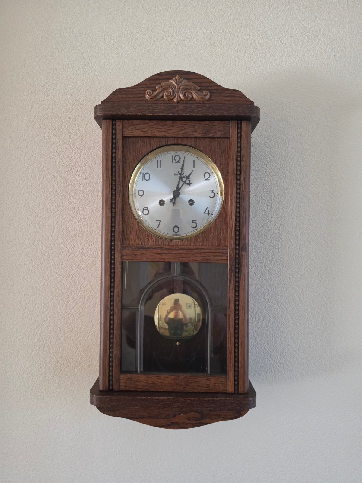 Teka houten wandklok met slinger, Ophalen