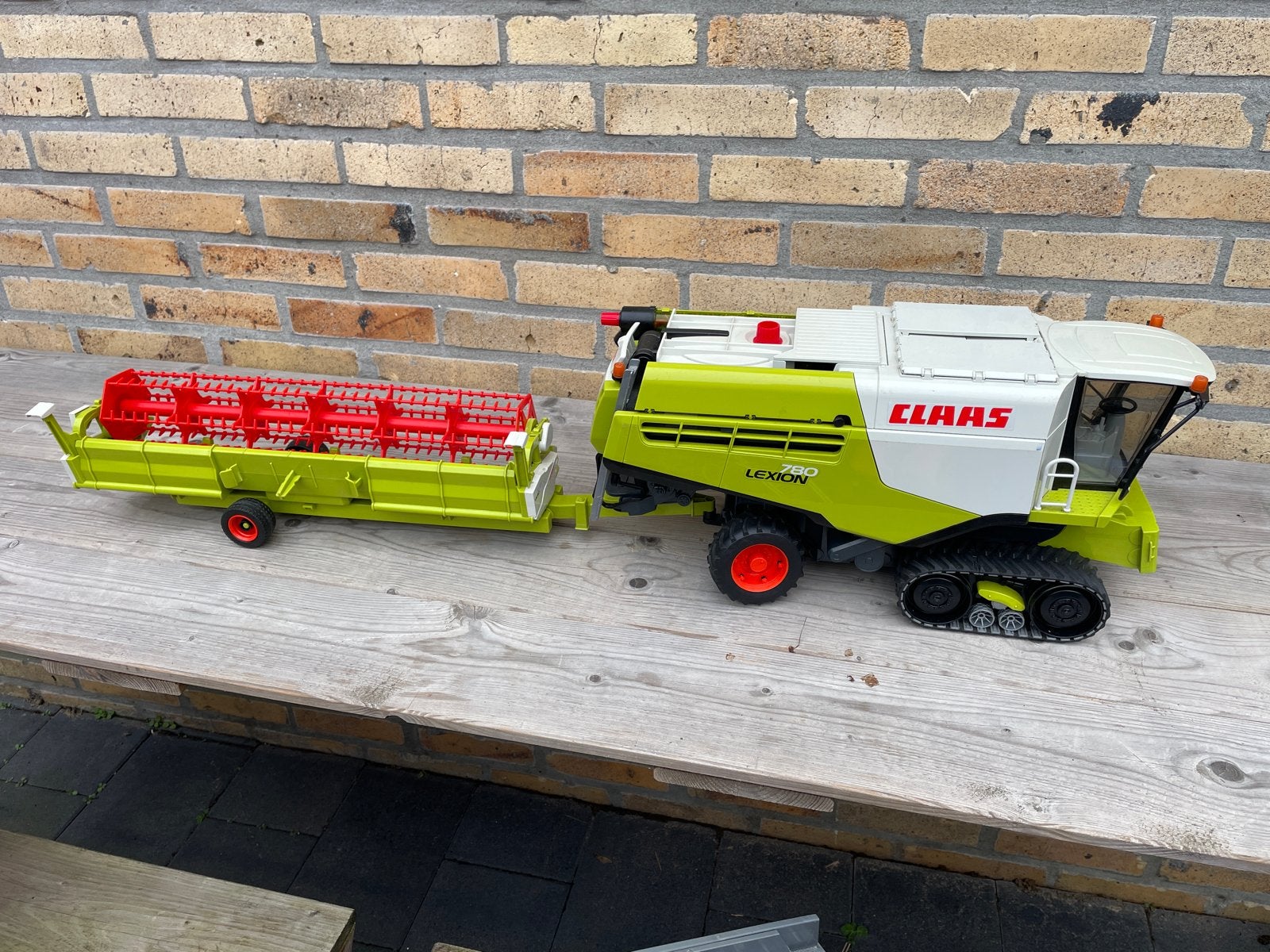 Bruder Claas Lexion 780 combine met trailer, Kinderen en Baby's, Speelgoed | Speelgoedvoertuigen, Ophalen of Verzenden, Gebruikt