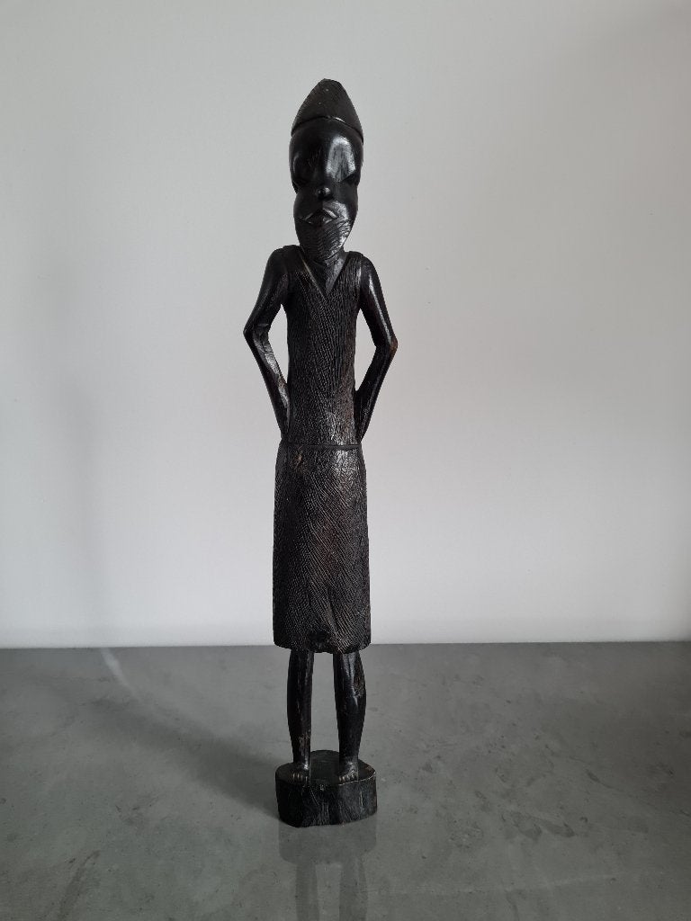 Beeld van Afrikaanse man in ebbenhout, Antiek en Kunst, Ophalen of Verzenden