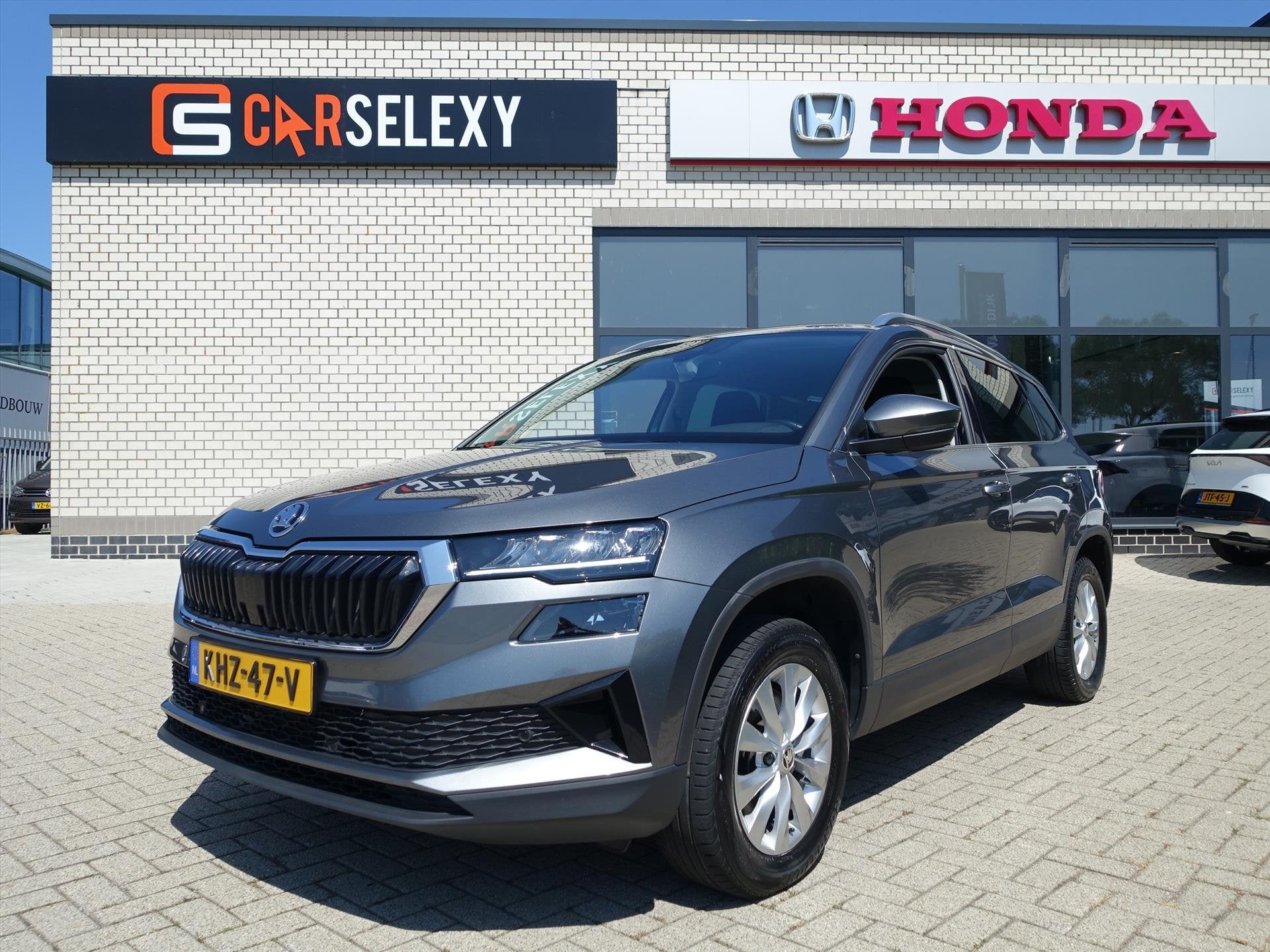 SKODA Karoq 1.5 TSI ACT Greentech 150pk Ambition Business, Auto's, 4 cilinders, Parkeersensor, Karoq, Bedrijf