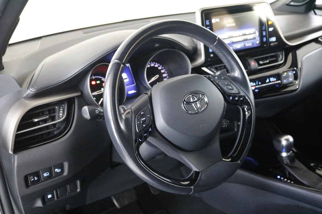 Toyota C-HR 1.8 Hybrid First Edition Clima | Leder | Cruise, Auto's, Toyota, Euro 6, 4 cilinders, 122 pk, Automatische klimaatregeling