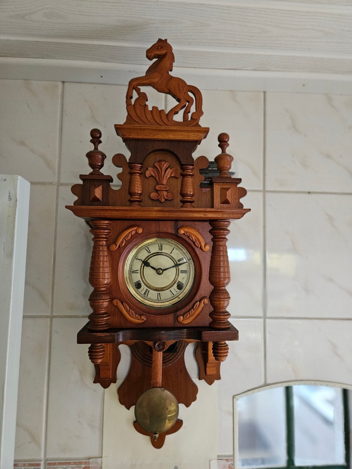 Duitse paardjesregulateur/klok, Ophalen
