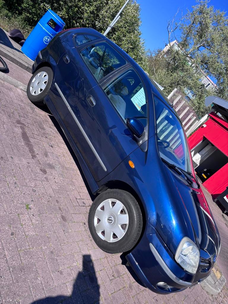 Nissan Almera Tino 1.8 2005 Blauw, Auto's, 4 cilinders, Origineel Nederlands, 115 pk, 66 €/maand