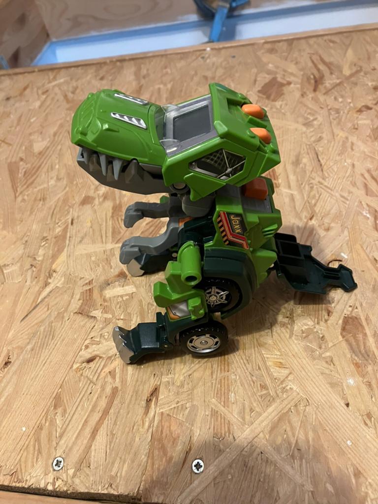 V-tech Jax de T-rex trasformeert van auto naar dino, Kinderen en Baby's, Speelgoed | Vtech, Ophalen of Verzenden, Zo goed als nieuw