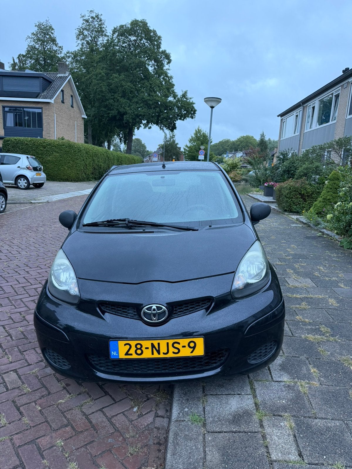 Toyota Aygo 1.0 12V Vvt-i 5DRS 2010 Zwart, Auto's, Voorwielaandrijving, 4 stoelen, Origineel Nederlands, Bedrijf