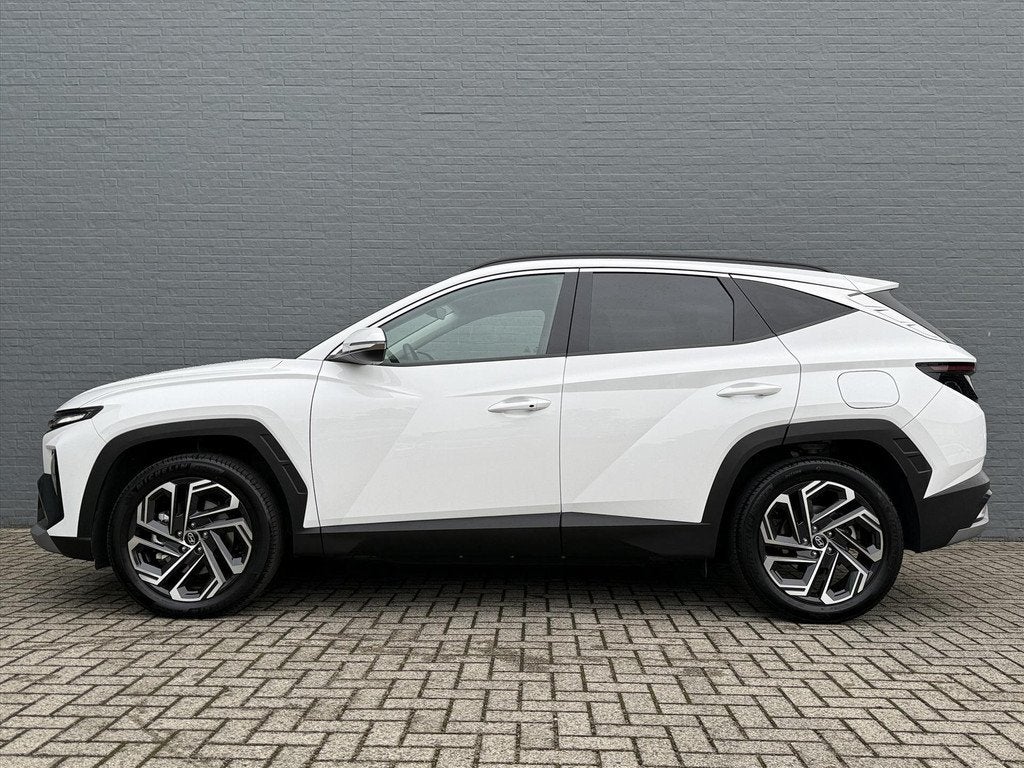Hyundai Tucson New 1.6 T-GDi PHEV 252pk 2WD Aut Comfort Smar, Auto's, 4 cilinders, Wit, Bedrijf, Hybride Elektrisch/Benzine