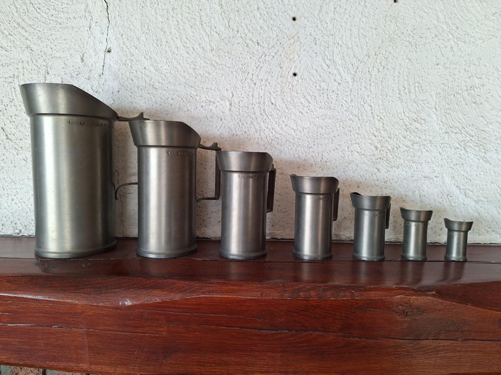 Set van 7 antieke tinnen maatbekers, Antiek en Kunst, Antiek | Tin, Ophalen of Verzenden