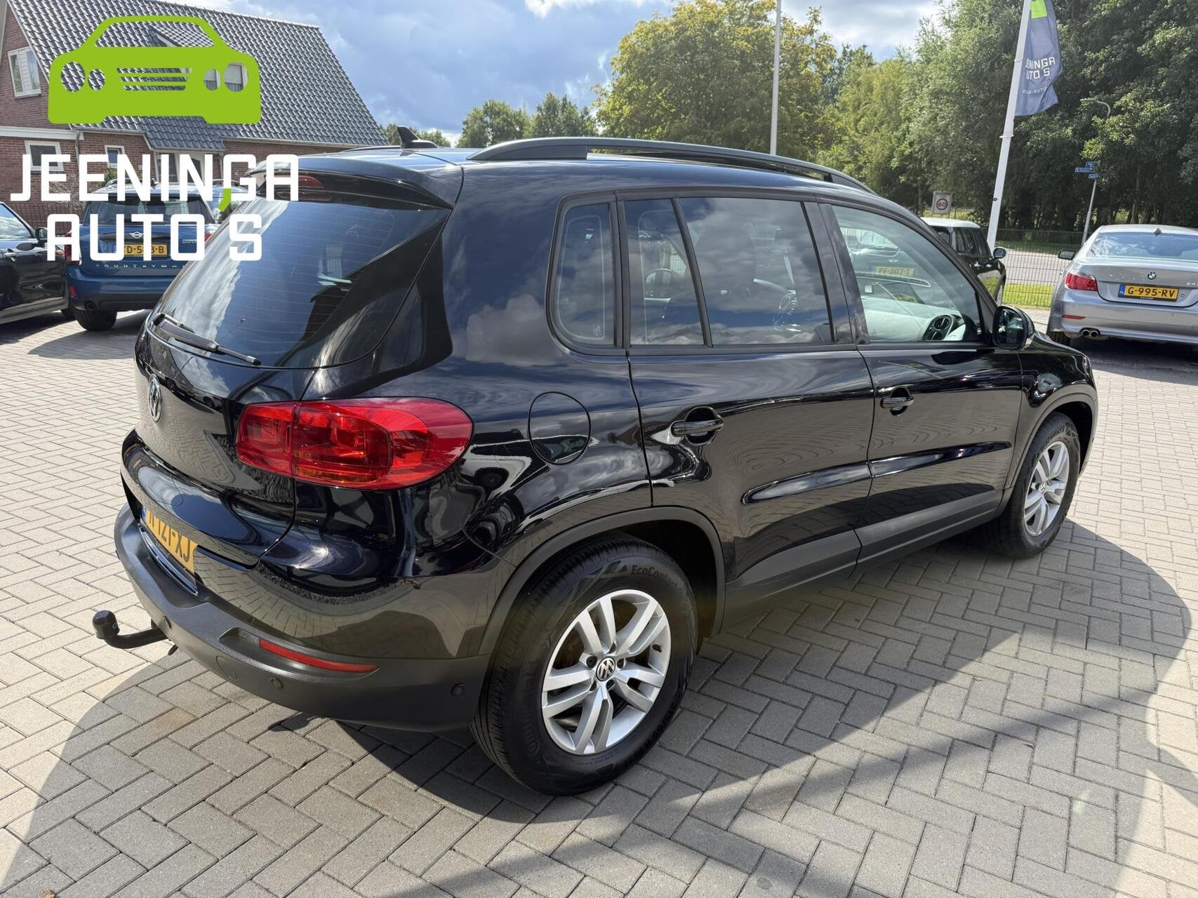 Volkswagen Tiguan 1.4 TSI Sport&Style|Trekhaak|Pano, Voorwielaandrijving, Gebruikt, 4 cilinders, Zwart
