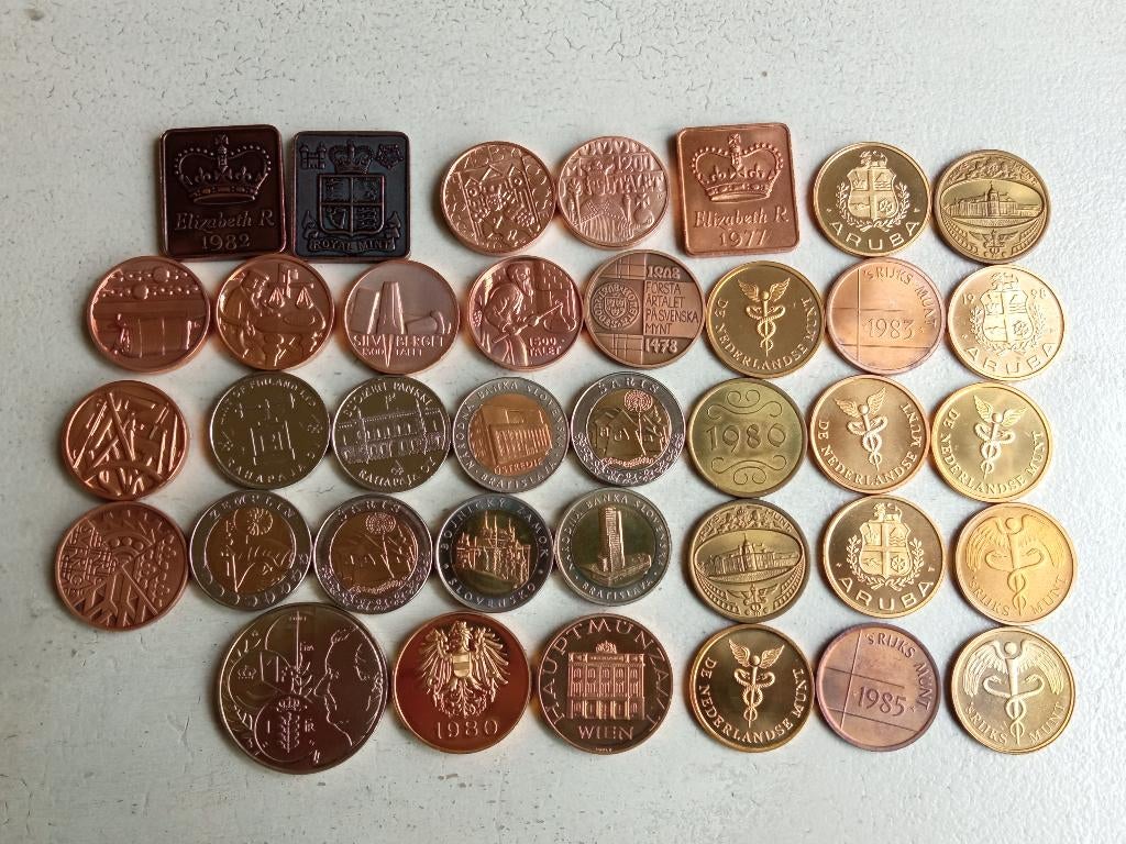 Lot penningen uit jaarsets., Ophalen of Verzenden, Overige materialen, Buitenland