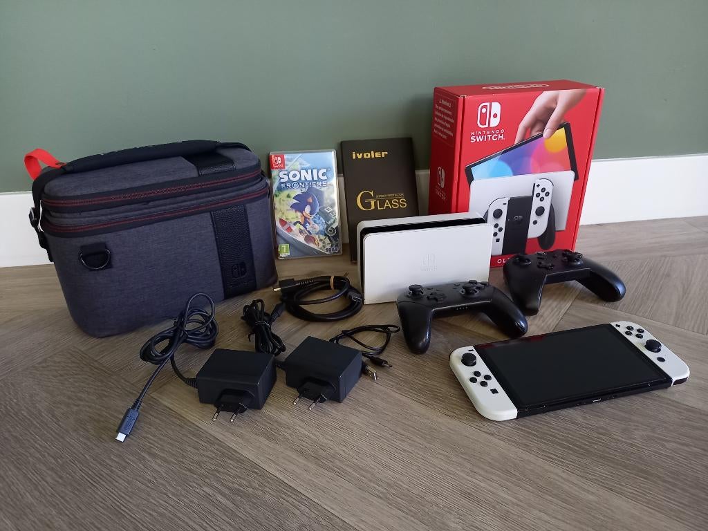 Te koop : Nintendo Switch OLED met accessoires, Met games, Zo goed als nieuw, Met 3 controllers of meer, Switch OLED