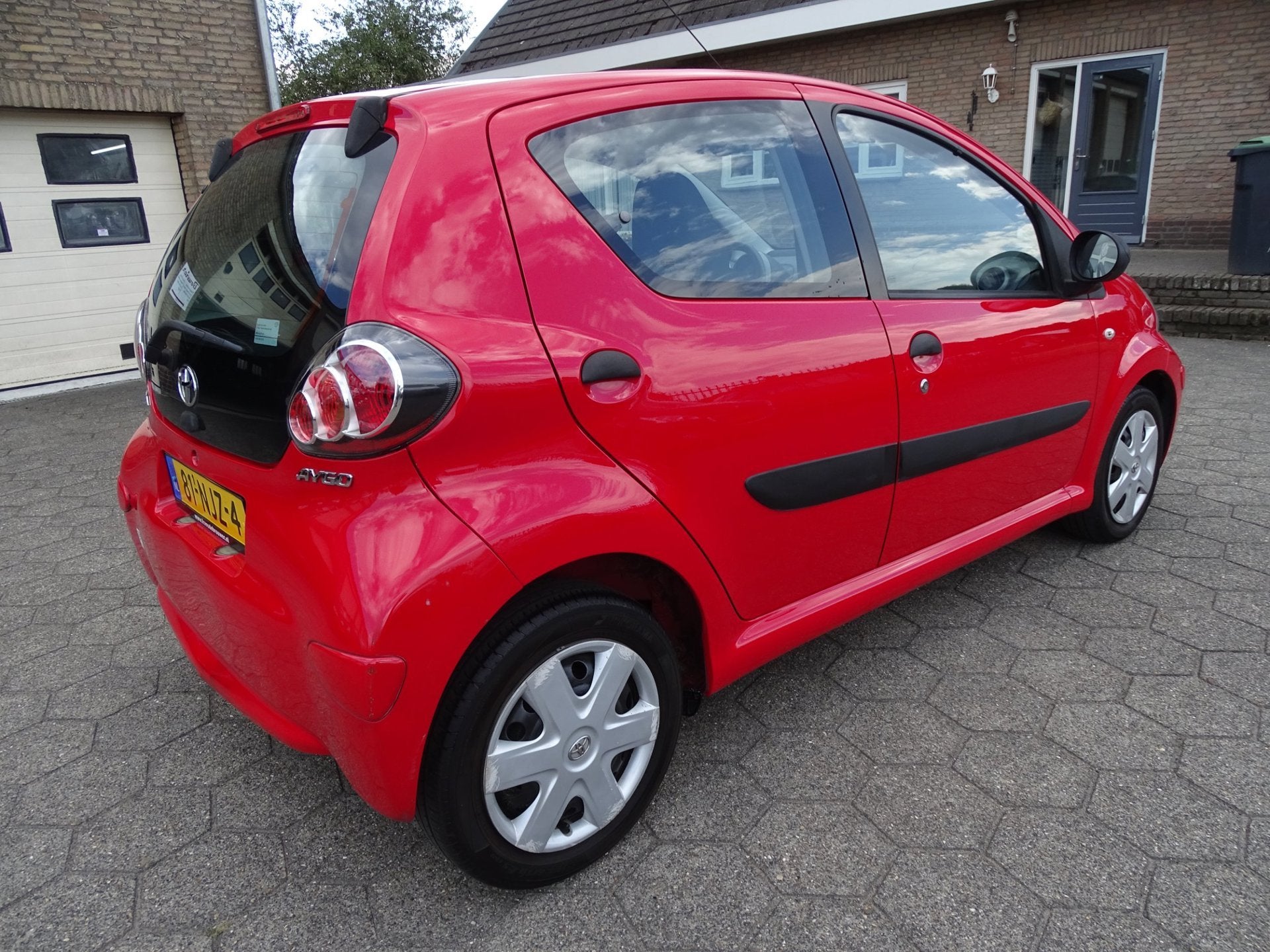 Toyota Aygo 1.0-12V Access 5 DEURS, Auto's, Voorwielaandrijving, Euro 5, Stof, Zwart