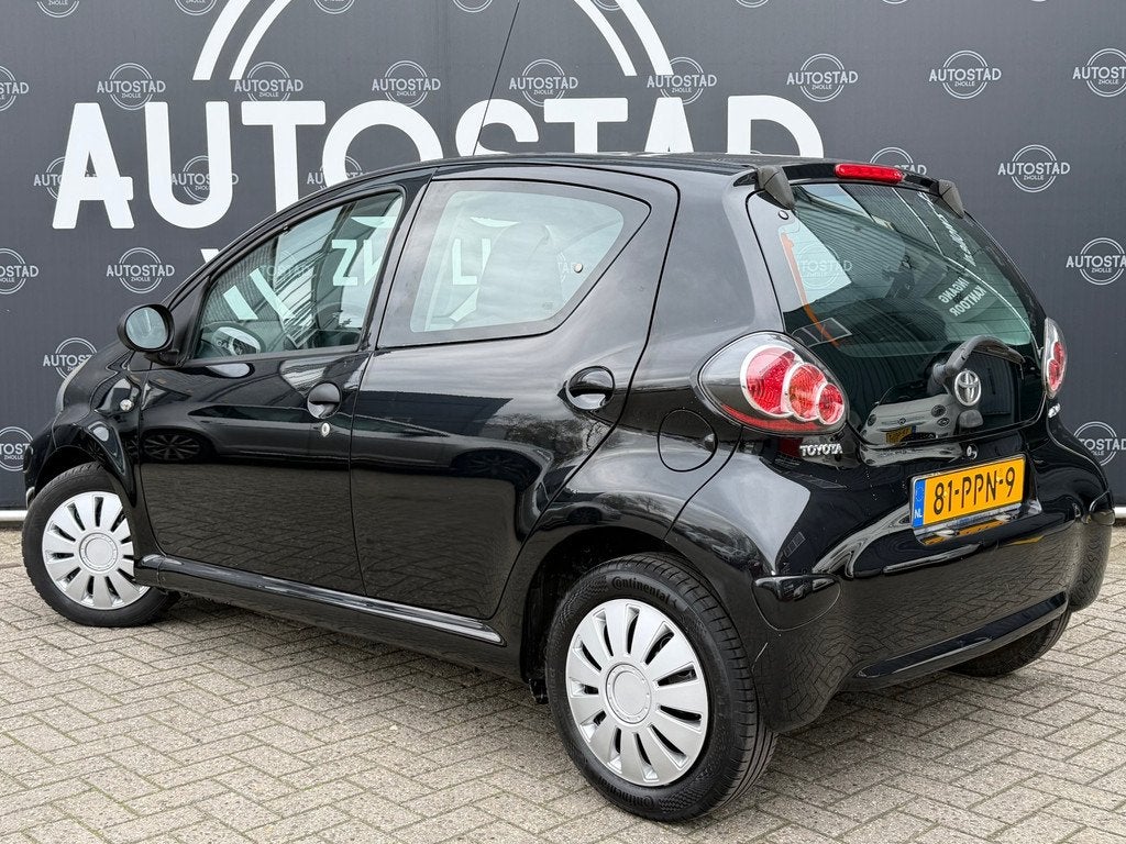 Toyota Aygo 1.0-12V Cool NL-Auto / 1ste Eigenaar / NAP / Air, Auto's, Toyota, Euro 5, Stof, Zwart, 4 stoelen