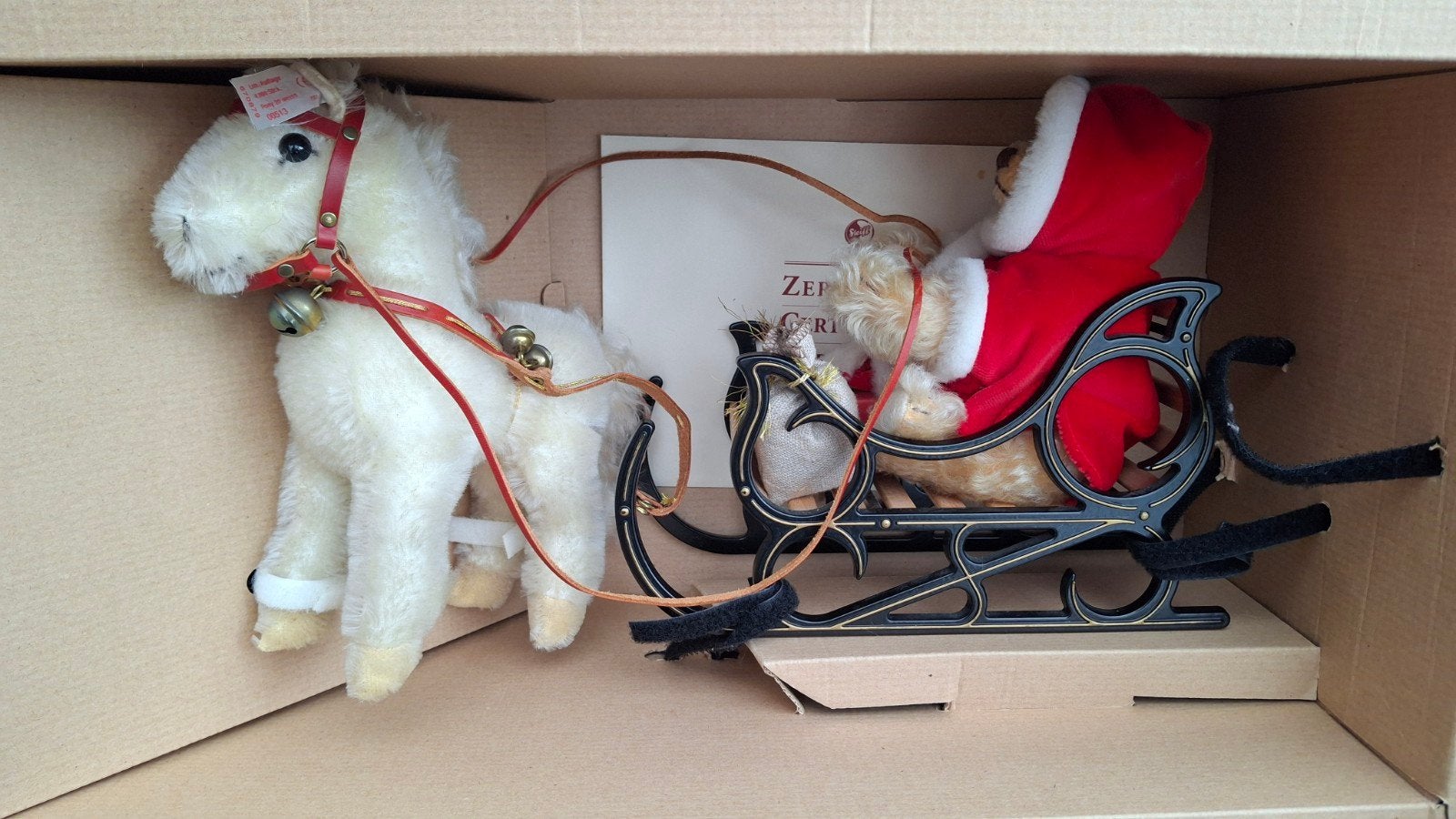Steiff Kerstman Teddybeer met Ponyslee - Limited Edition, Overige karakters, Beer, Ophalen of Verzenden, Zo goed als nieuw