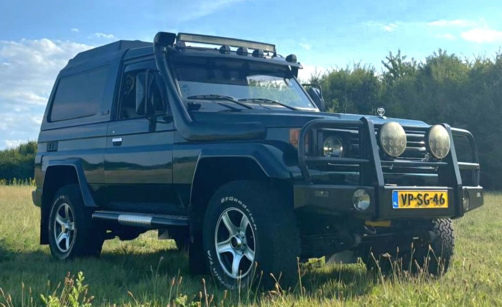 Toyota Landcruiser 4.2 HZJ73 Super Heavy Duty LX (1997) 1HZ, Stof, Metallic lak, 4164 cc, Origineel Nederlands