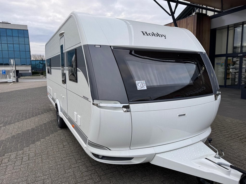 Hobby Prestige 560 FC 2026 MEGA KORTING € 3200,-!!!, Caravans en Kamperen, Standaardzit, Bedrijf, Schokbreker, 5 tot 6 meter