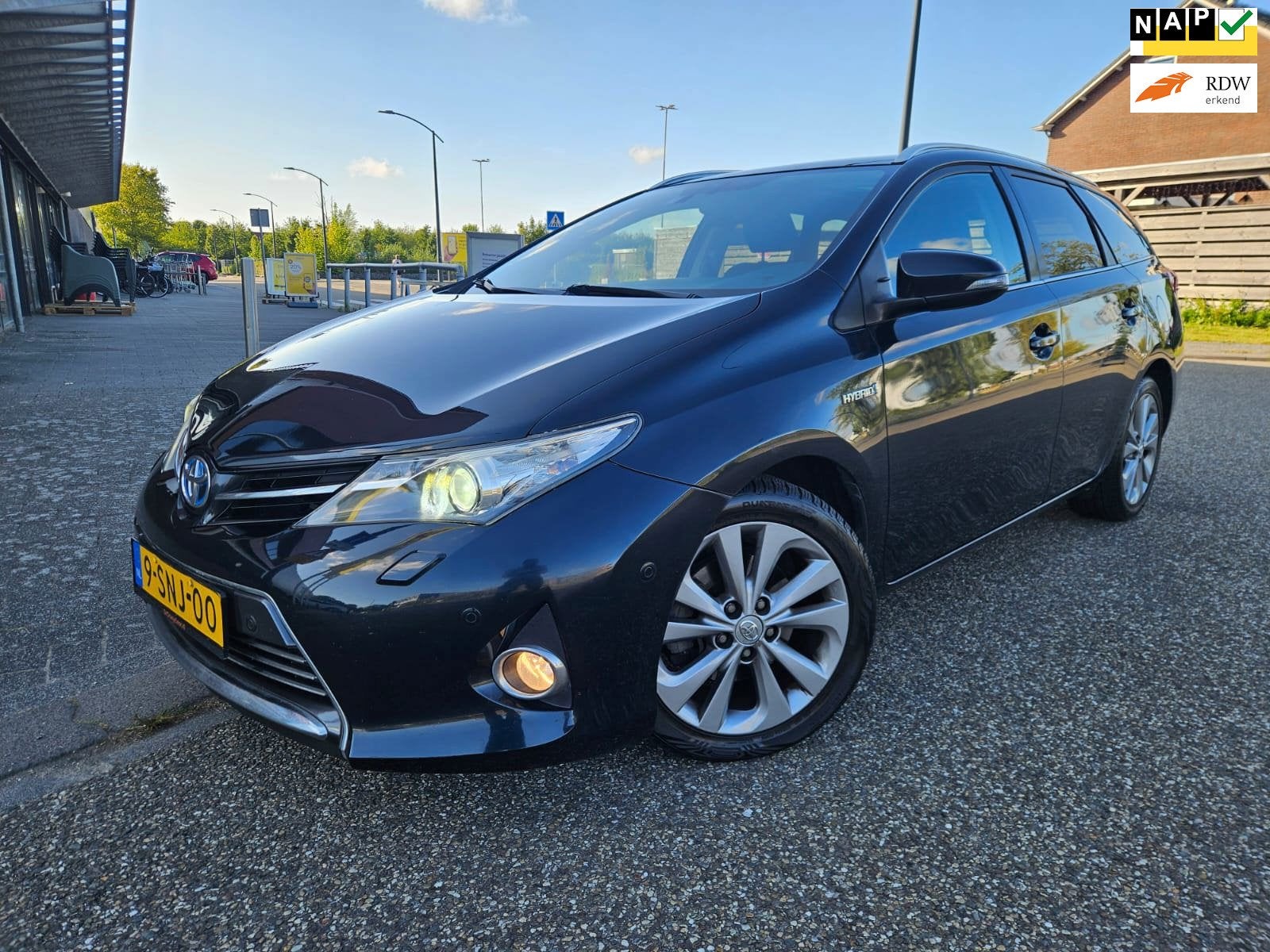 Toyota Auris Touring Sports 1.8 Hybrid Lease Pro GARANTIE, Euro 5, Gebruikt, Leder en Stof, Origineel Nederlands