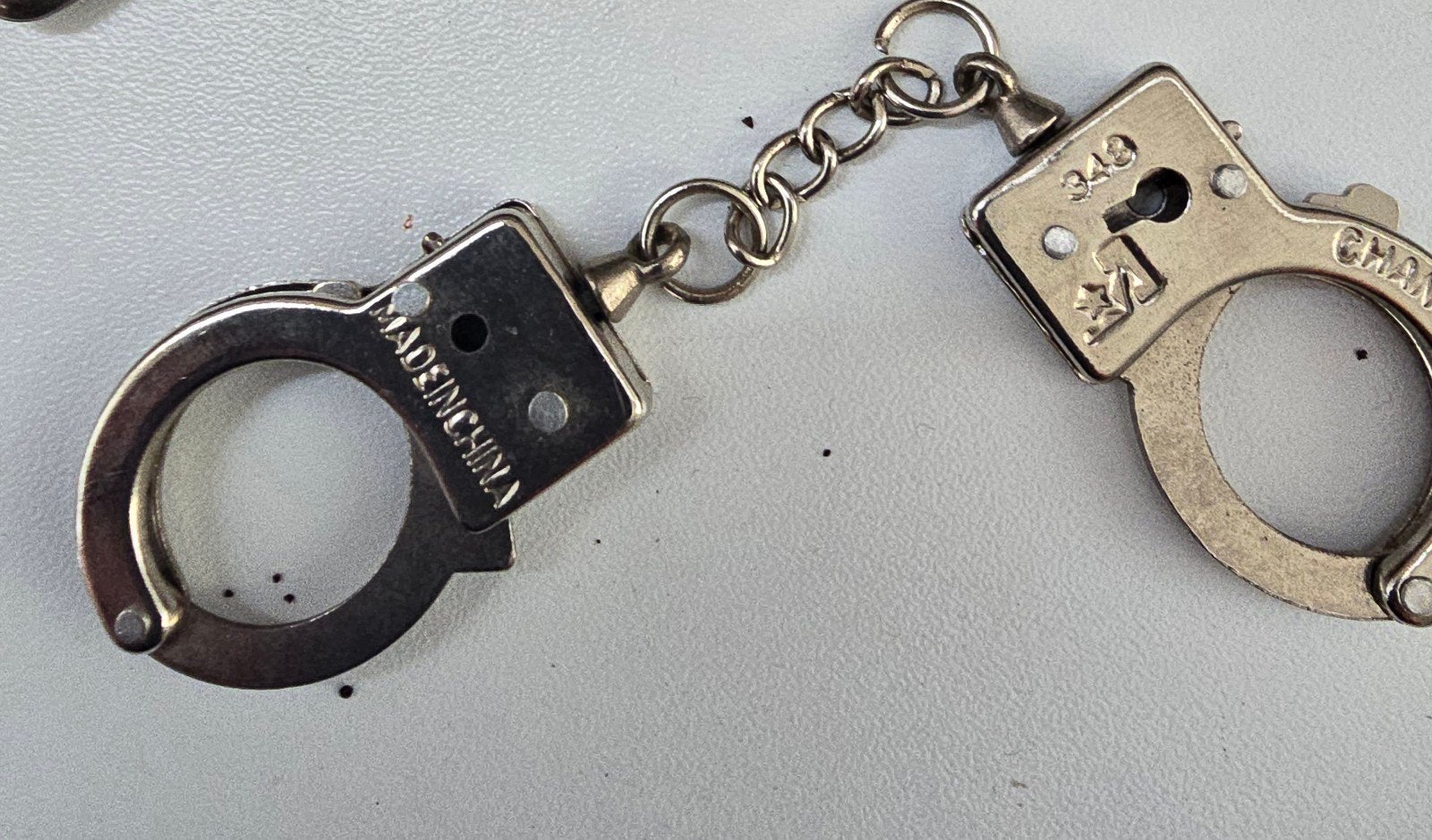 Sleutelhanger handboeien - Made in China, Ophalen of Verzenden