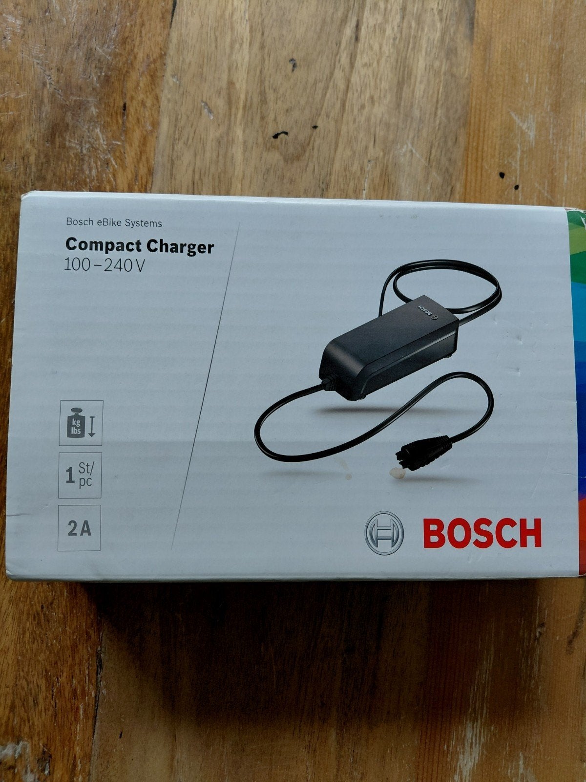 Bosch Compact Charger 100-240V voor elektrische fiets, Fietsen en Brommers, Ophalen, Zo goed als nieuw