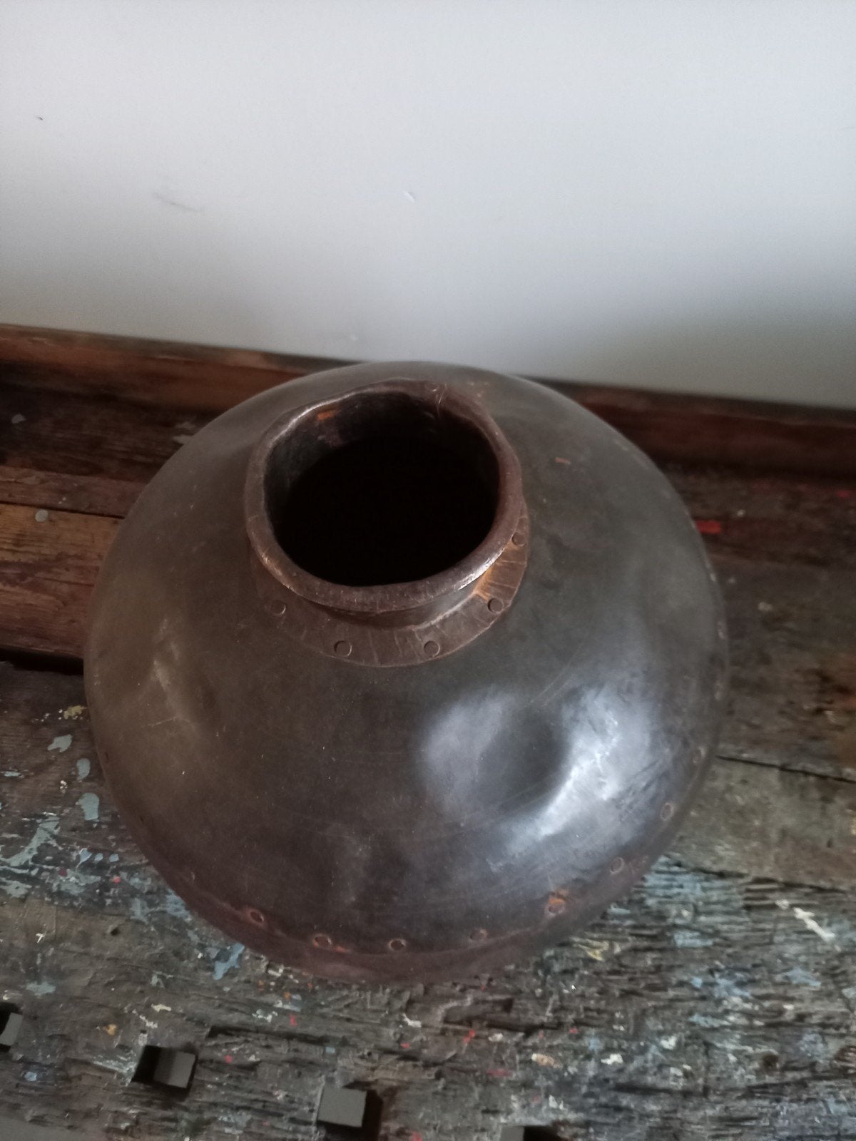 Oude Indiase waterkruik, Ophalen