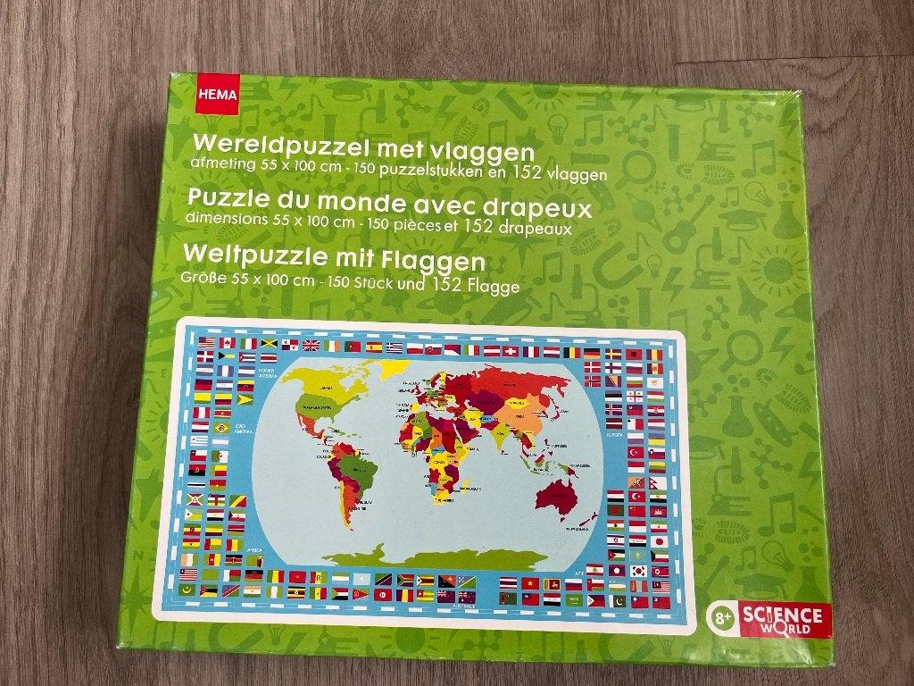 Wereldpuzzel met vlaggen hema., Kinderen en Baby's, Ophalen of Verzenden, Meer dan 50 stukjes, Zo goed als nieuw