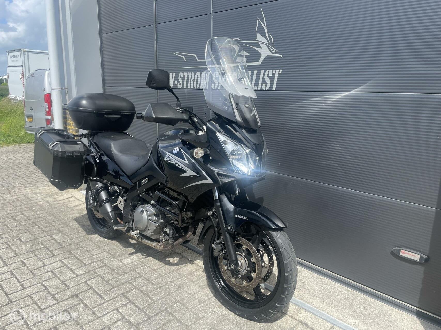 Suzuki DL 650 ABS V-Strom Black Rhino bomvol opties !, Motoren, Motoren | Suzuki, Bedrijf, Meer dan 35 kW, Toermotor, ABS