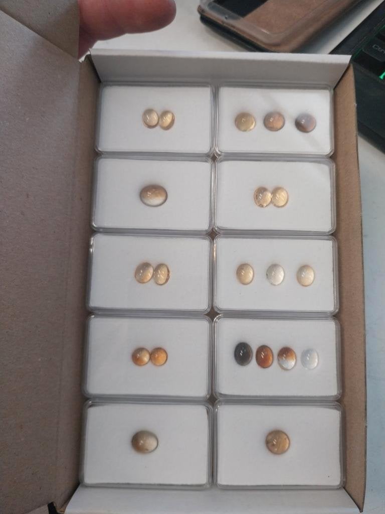 Lot met citrien en rookkwarts cabochons, Ophalen of Verzenden, Mineraal